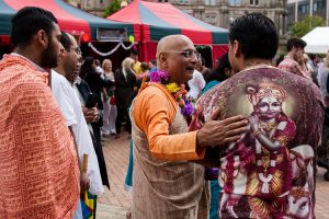 Devotees and officiants mingling after the Ratha Yatra procession
