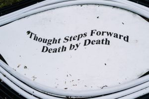 Memento mori inscription on the ground of Birchbone Garden
