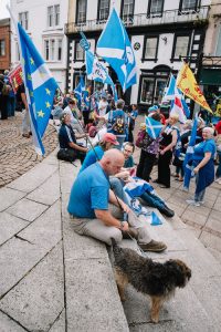English Scots for Yes congregate on the steps near Dumfries fountain