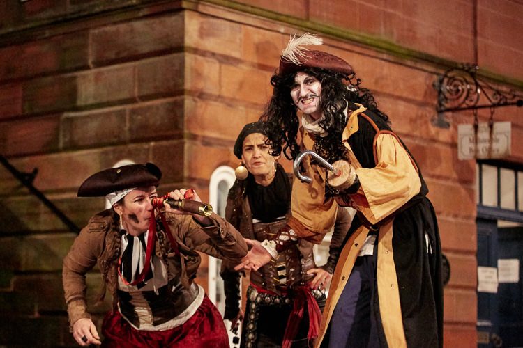 Captain Hook and his pirates outside Midsteeple for Peter Pan themed show in Dumfries