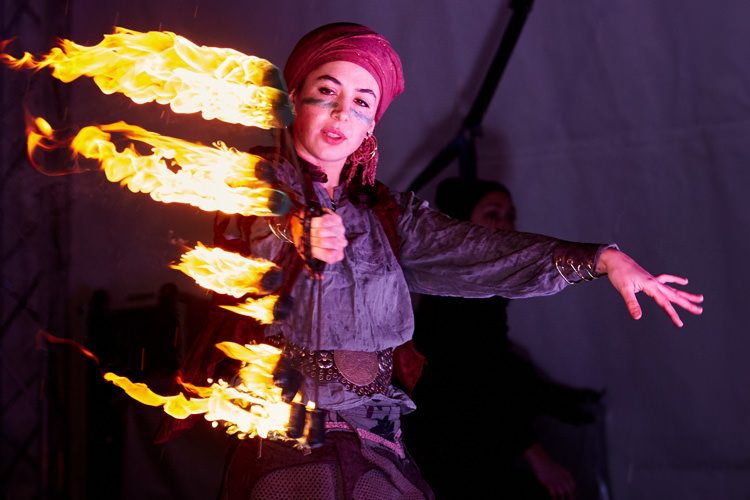 Fire dancer from Delighters theatre performs in Dumfries